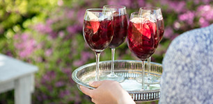 rosé in glasses on a table with fruit